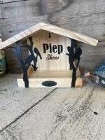 Vogelvoer huisje piep show